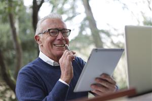 Senior Man with Tablet