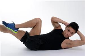 Man exercising with upper body twist